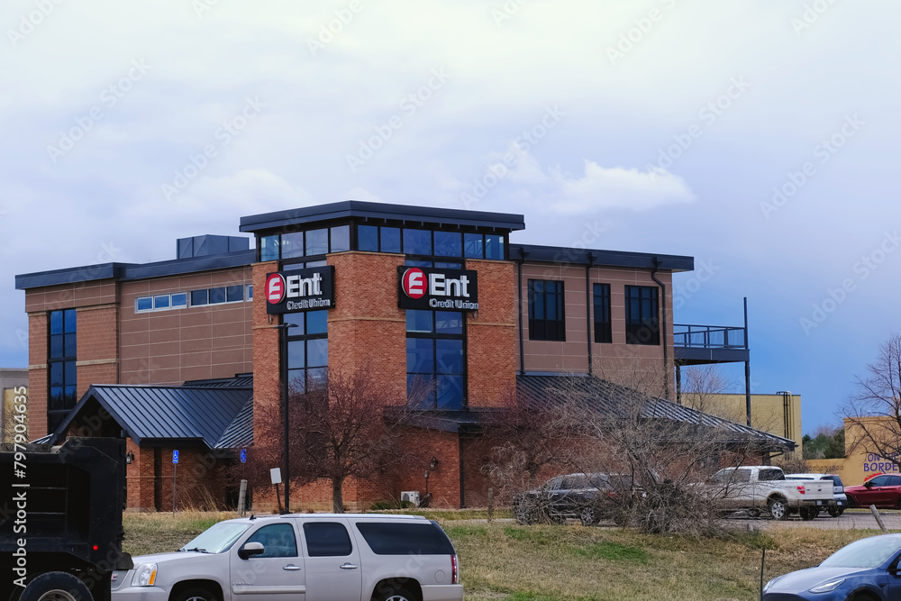 Small Ent Building Ent Credit Union building entrance with company brand name sign and ...