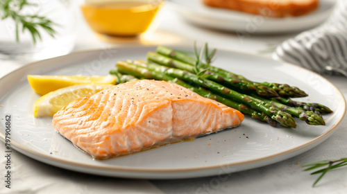 Grilled Salmon Fillets with Asparagus on Ceramic Plate 