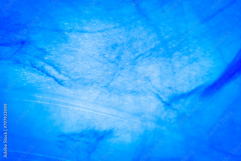 Naklejka premium Macro shot of blue marbled vinyl record