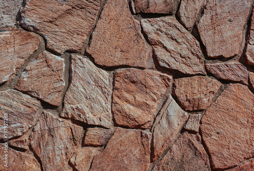 Natural stone wall background or texture