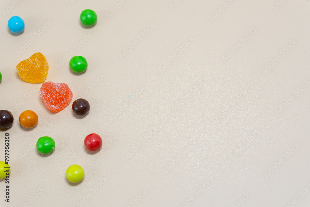 Heart shaped Candy and multi colored candy on Isolated on White Background. Heart shaped Candy and multi colored candy on Isolated on White Background.