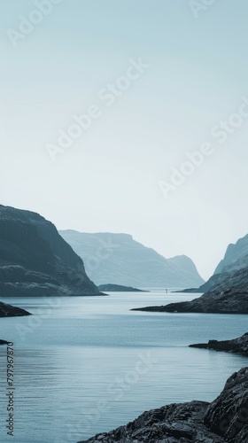 b'A boat sails through a narrow fjord between tall mountains' © Adobe Contributor