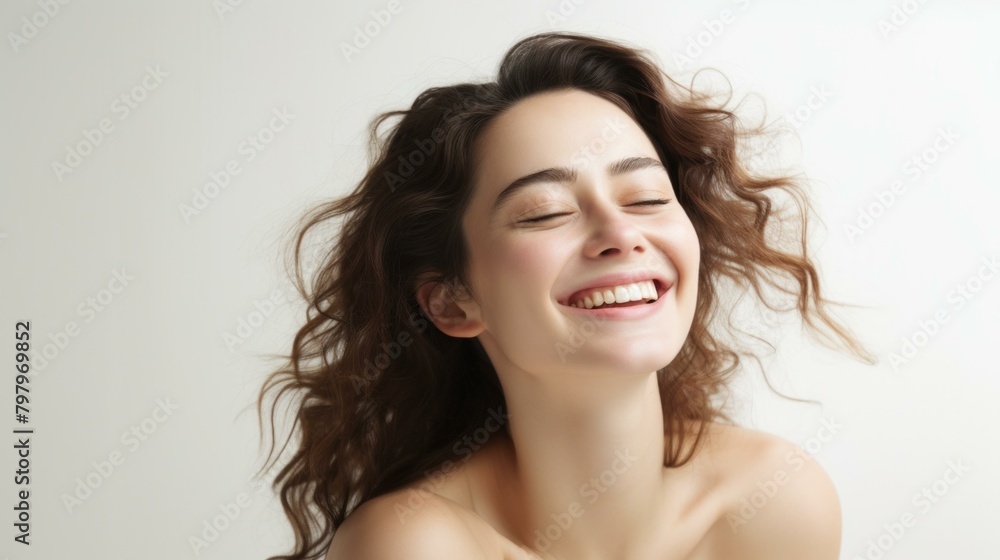 b'Portrait of a beautiful young woman with long brown hair smiling happily' b'Portrait of a beautiful young woman with long brown hair smiling happily'