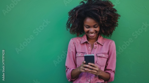 Woman Smiling with Smartphone photo