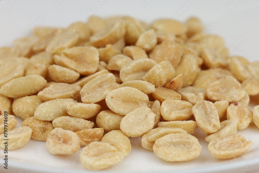 Close-Up of Salted Peanuts on White Close-Up of Salted Peanuts on White