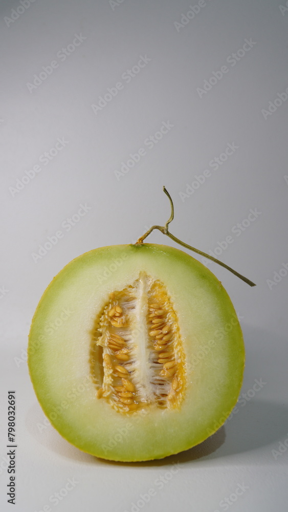 A piece of greeniegal melon isolated on a white background A piece of greeniegal melon isolated on a white background