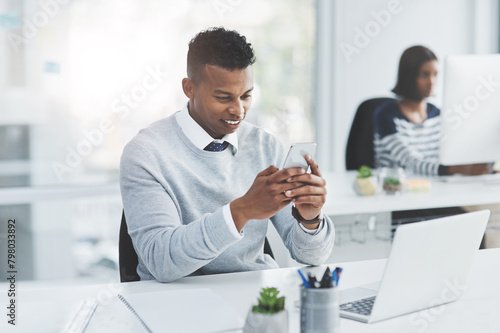 Office, business and man with smartphone, typing and connection with social media, laptop and internet. Employee, staff and consultant with cellphone, contact and message with text and digital app