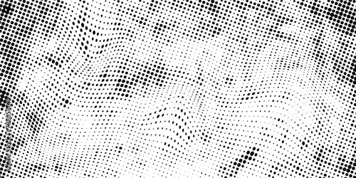 Abstract wave halftone black and white. Monochrome texture for printing on badges, posters, and business cards. Vintage pattern of dots randomly arranged photo