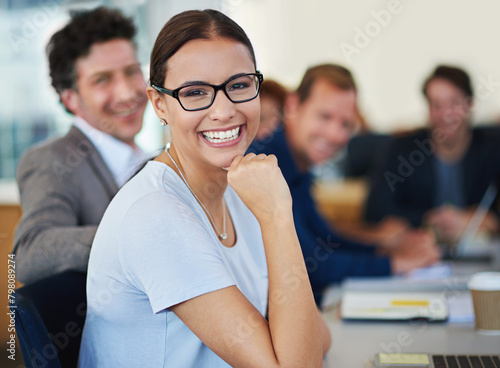 Portrait  businesswoman and smile in seminar for conference or meeting in boardroom. Female employee  happy and coworkers in office for teamwork  collaboration and laptop in workplace with group