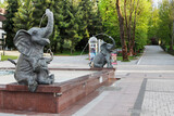 RABKA ZDROJ, POLAND - APRIL 26, 2024: Fountain with elephants in front of main building of health resort Rabka Zdroj, Poland.
