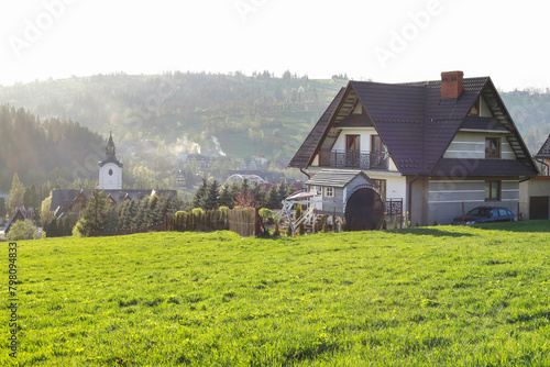 Fototapeta Naklejka Na Ścianę i Meble -  PORONIN, POLAND - APRIL 12, 2024: Big village Poronin, Poland.