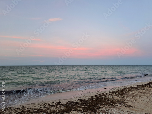 Progreso is a Mexican port city on the Yucatan Peninsula with its iconic arched pier and famous boardwalk