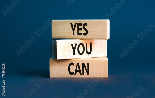 Motivational and Yes you can symbol. Concept words Yes you can on beautiful wooden blocks. Beautiful grey table grey background. Business motivational and Yes you can concept. Copy space.