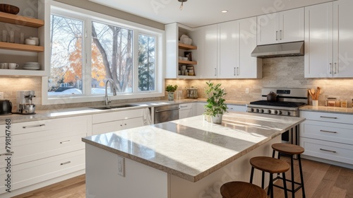 b'Modern kitchen design with white cabinets, stainless steel appliances, and a large island'