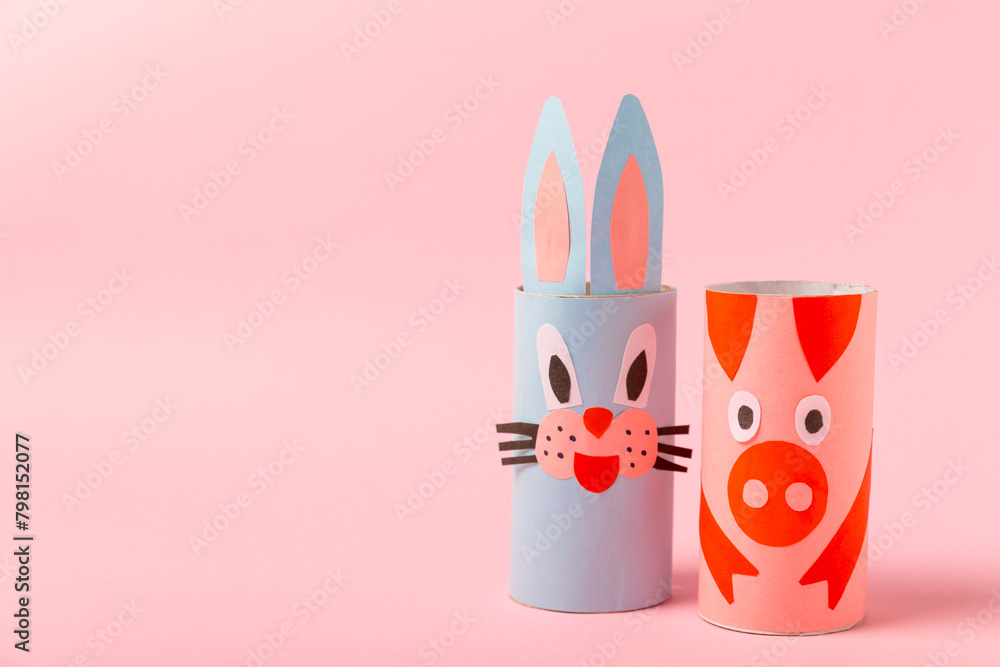 Toilet paper crafts on a colored background. Kids crafts made with toilet paper roll. DIY. Handmade. Paper toys. Origami animals. Concept of children's educational games. Place for text. Copy space. Toilet paper crafts on a colored background. Kids crafts made with toilet paper roll. DIY. Handmade. Paper toys. Origami animals. Concept of children's educational games. Place for text. Copy space.