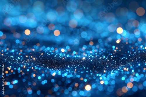 b'Blue and gold glowing particles background'