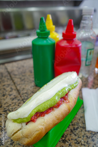 Santiago, Chile - 26 Nov, 2023: Traditional Completo Hot Dogs on sale at a snack vendor in Santiagos Plaza de Armas