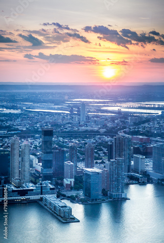 Jersey City skyline seen at sunset from above with colorful sunset © littleny