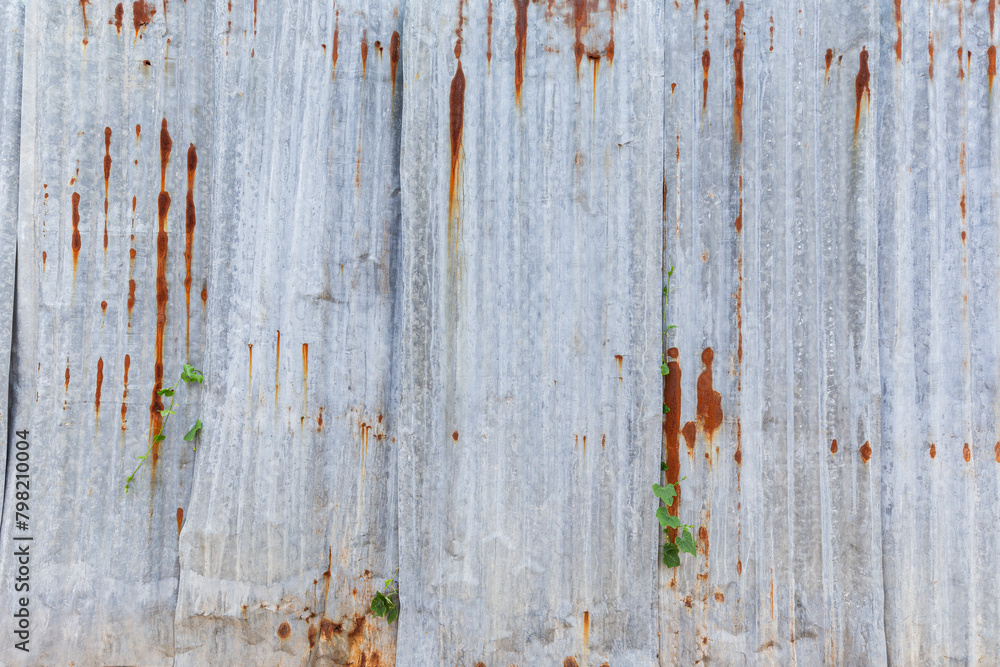 Front view of rusty and corrugated iron metal construction site wall. Abstract high resolution full frame textured background, copy space. Front view of rusty and corrugated iron metal construction site wall. Abstract high resolution full frame textured background, copy space.
