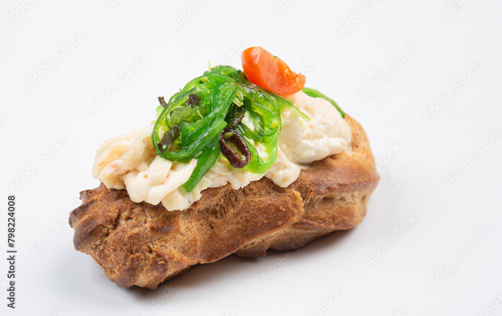 Eclair on a white background with meat and cheese