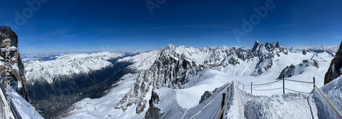 Haute-Savoie, France, 04-25-2024: off ski slope from L’Aiguille du Midi (Needle at midday), the highest spire (3.842 m) of the Aiguilles de Chamonix in the northern part of the Mont Blanc massif