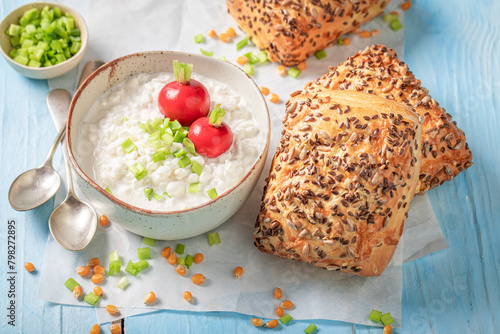 Healthy and delicious corn bun with cottage cheese and radish.