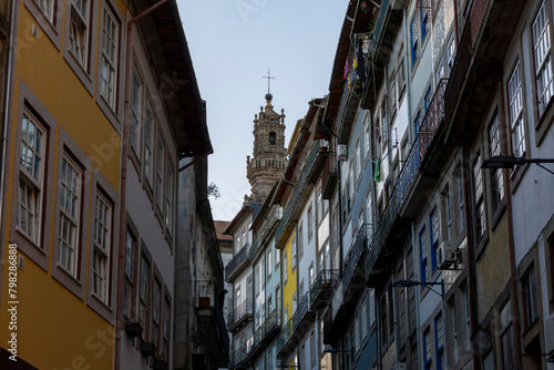 Typical colorful houses and the Clerigos Tower in Porto city, Portugal