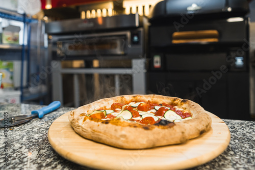 Tasty homemade pizza cooking in an oven at home. High quality photo