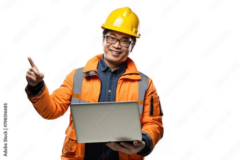 A Japanese civil engineer wearing safety gear laptop pointing computer. A Japanese civil engineer wearing safety gear laptop pointing computer.