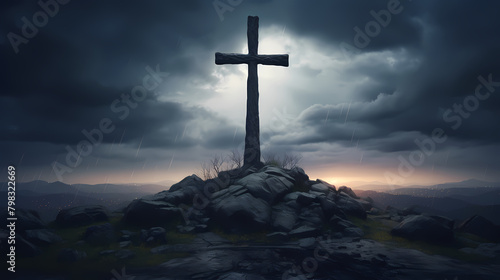 The cross stands on top of the rock