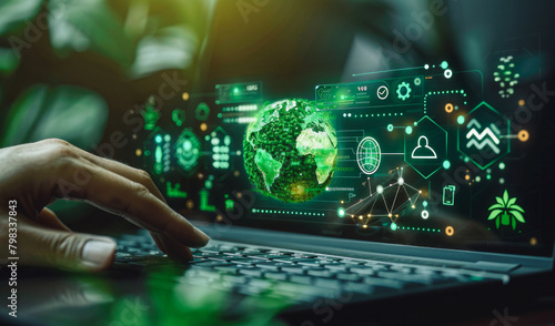 
Eco-Tech and Sustainability Interface: A person points to a digital card over a laptop with icons like a globe and plant, symbolizing environmental sustainability.