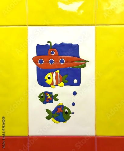Artistic yellow rectangle tile with submarine and fish painting in electric blue