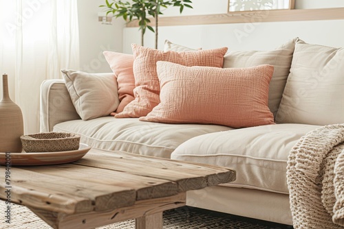 Peach Colors and Cozy Minimalist Vibes: Beige Sofa and Potted Plant in a Stylish Living Room