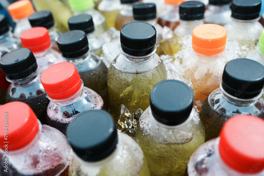 Mixed Ice cold juice bottle in the market, healthy fruit drink concept Mixed Ice cold juice bottle in the market, healthy fruit drink concept