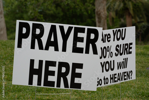 prayer here and go to heaven signs at an outdoor park