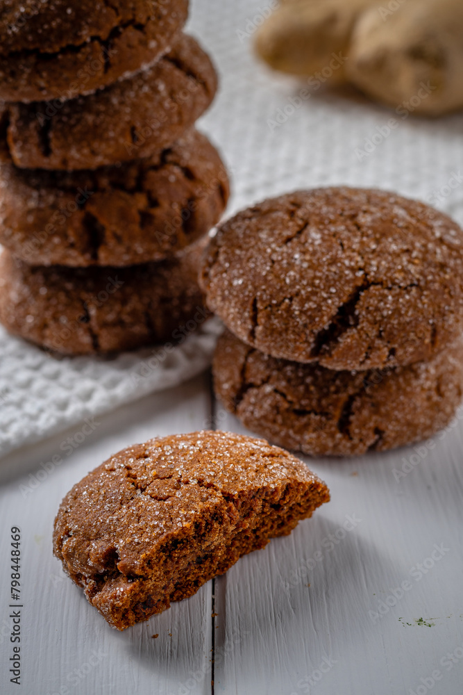 Warm Homemade Gingersnap Cookies on a wooden white board