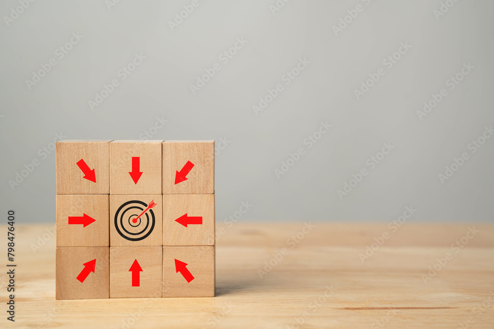 Block with target aiming at dartboard and upward arrow. Goal setting concept, business success, goal setting, marketing. Corporate growth and finance.