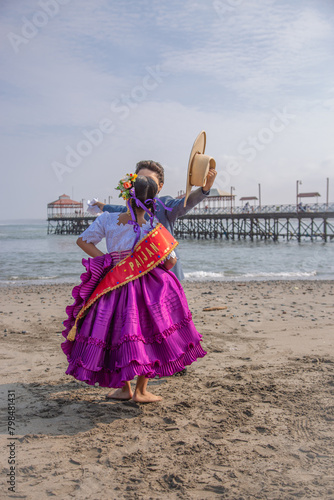 Young couple of kids Marinera dancers peruvian dance traditional Peru