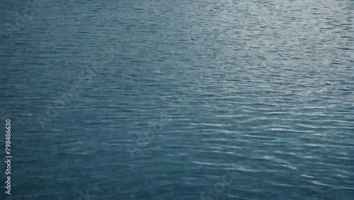 A serene sky blue textured background resembling gently rippling water ai_generated