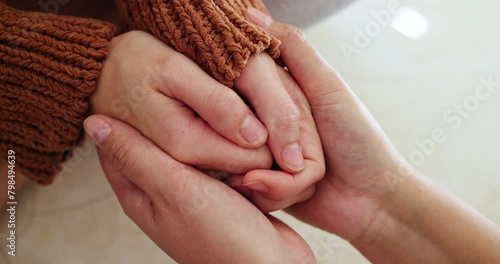 People, holding hands and anxiety support for mental health grief or depression empathy, safety or diagnosis. Person, finger and ptsd compassion or stress worry in home for love unity, care or trauma photo