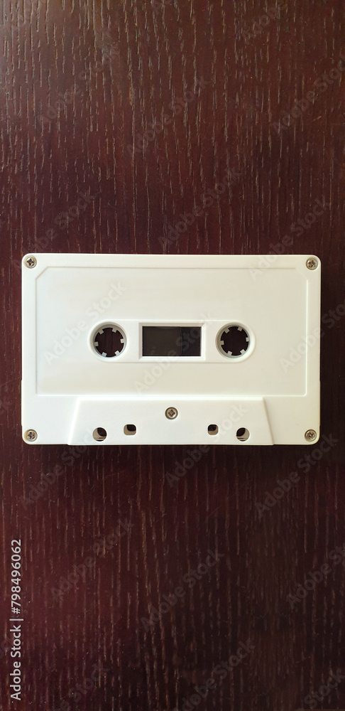 Obraz premium blank white audio cassette tape on table