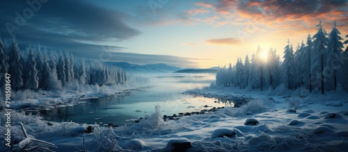 Frozen lake in winter forest at sunset. Panoramic view