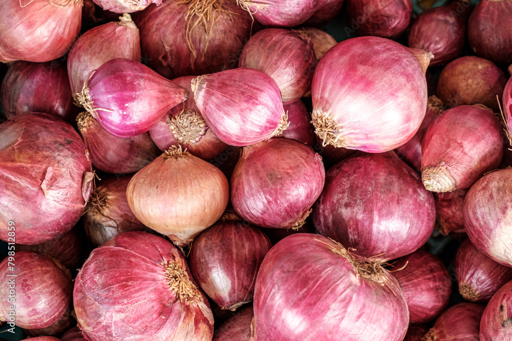 Red onions at the traditional market in Thailand Red onions at the traditional market in Thailand