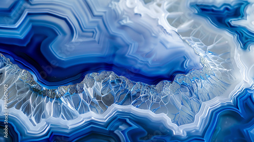Pearlescent white and deep blue alcohol ink in ultra HD, with swirling agate ripples.