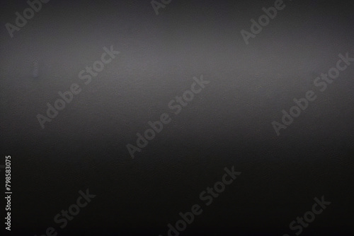 マットグレーの滑らかなプラスチックの表面に細かい質感があり、右側にビネットが付いています。絶妙なテクスチャ背景、柔らかい空白の背景 
