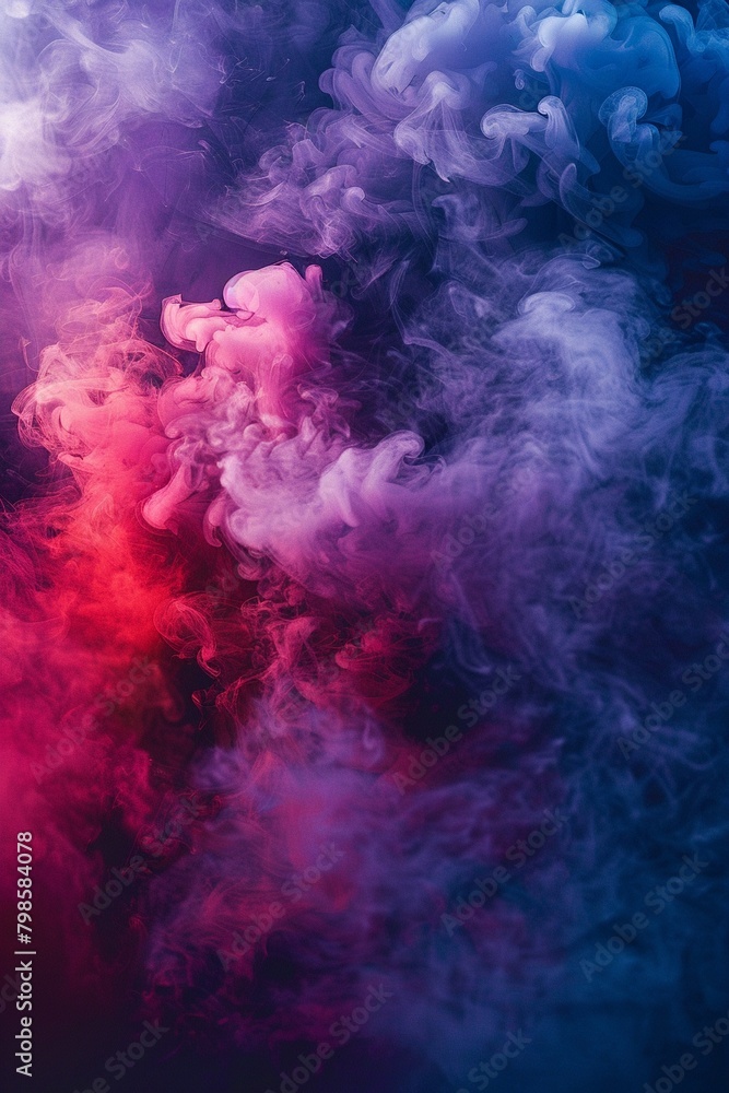 Dramatic smoke and fog in contrasting vivid red, blue, and purple colors Vivid and intense abstract background or wallpaper Dramatic smoke and fog in contrasting vivid red, blue, and purple colors Vivid and intense abstract background or wallpaper