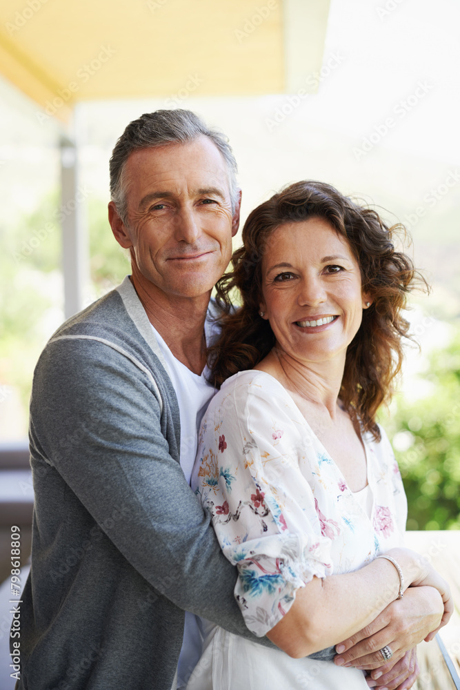 Portrait, smile and mature couple hug in house patio for love, connection or trust for partnership together. Face, man and embrace woman for care, commitment and relationship for support in home Portrait, smile and mature couple hug in house patio for love, connection or trust for partnership together. Face, man and embrace woman for care, commitment and relationship for support in home