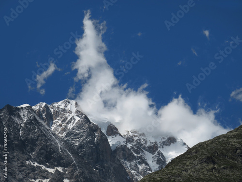 View of the Mont-Blanc (altitude: 4.810 m) during the summer from the Pointe Helbronner. Alps Chain Mountains. Border between Italy and France.
