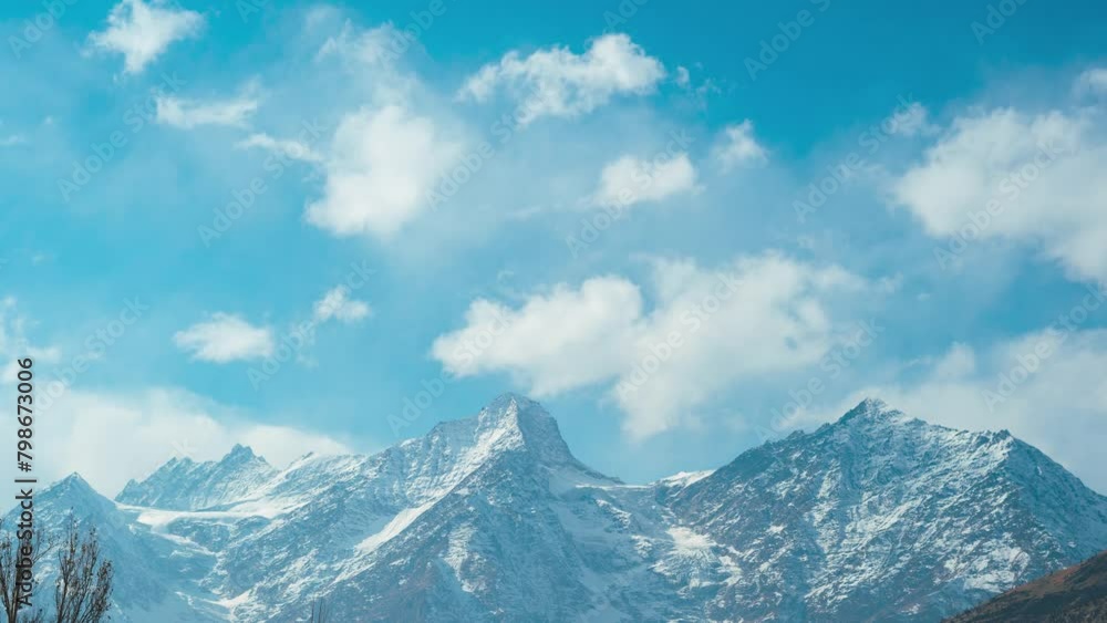 4K Timelapse of clouds moving above snow covered Himalaya mountains in Lahaul, Himachal Pradesh, India. Clouds over snow covered mountains. Himalayas timelapse. Mountain nature landscape. 4K Timelapse of clouds moving above snow covered Himalaya mountains in Lahaul, Himachal Pradesh, India. Clouds over snow covered mountains. Himalayas timelapse. Mountain nature landscape.