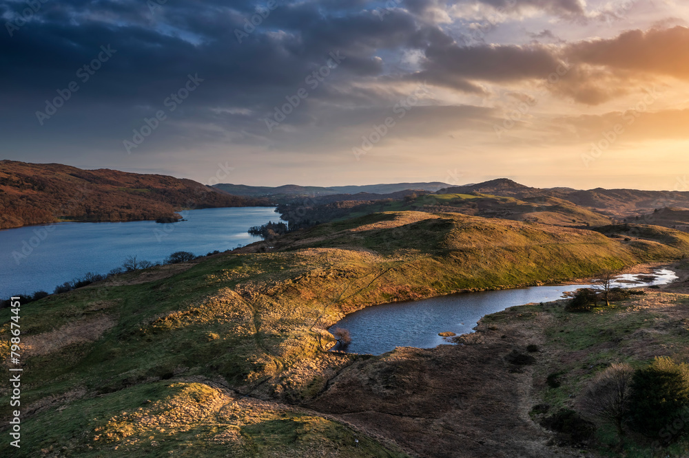 Stunning, Spring sunset landscape aerial drone image in Lake District looking towards Old Man of Coniston Stunning, Spring sunset landscape aerial drone image in Lake District looking towards Old Man of Coniston